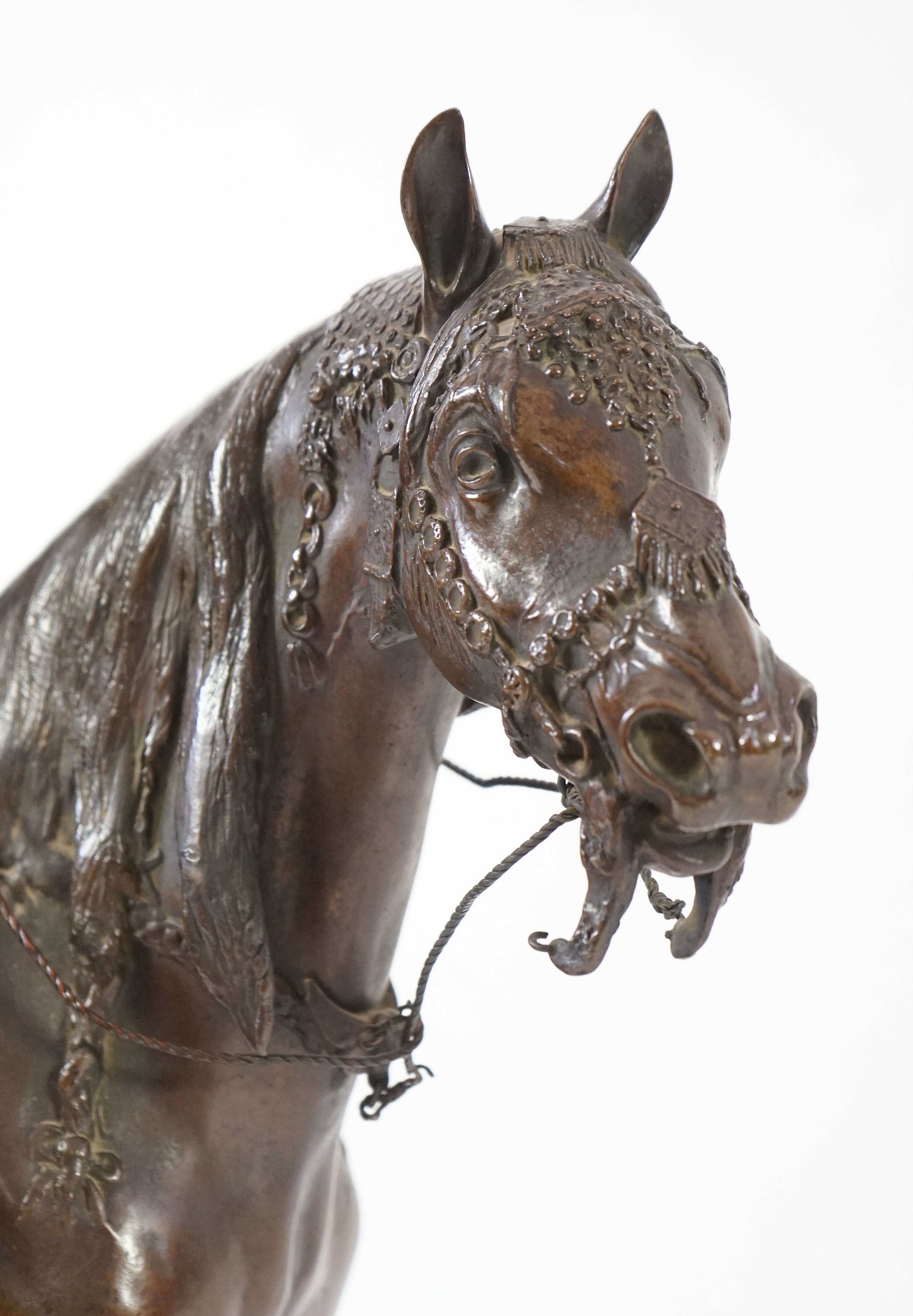 Walter Winans (St. Petersburg, 1852-Parsloe Park, Essex, 1920), a cast bronze of the artist, as a cowboy, riding the Arab stallion Skowronek, 50cm wide, 66cm high, overall 79.5cm high